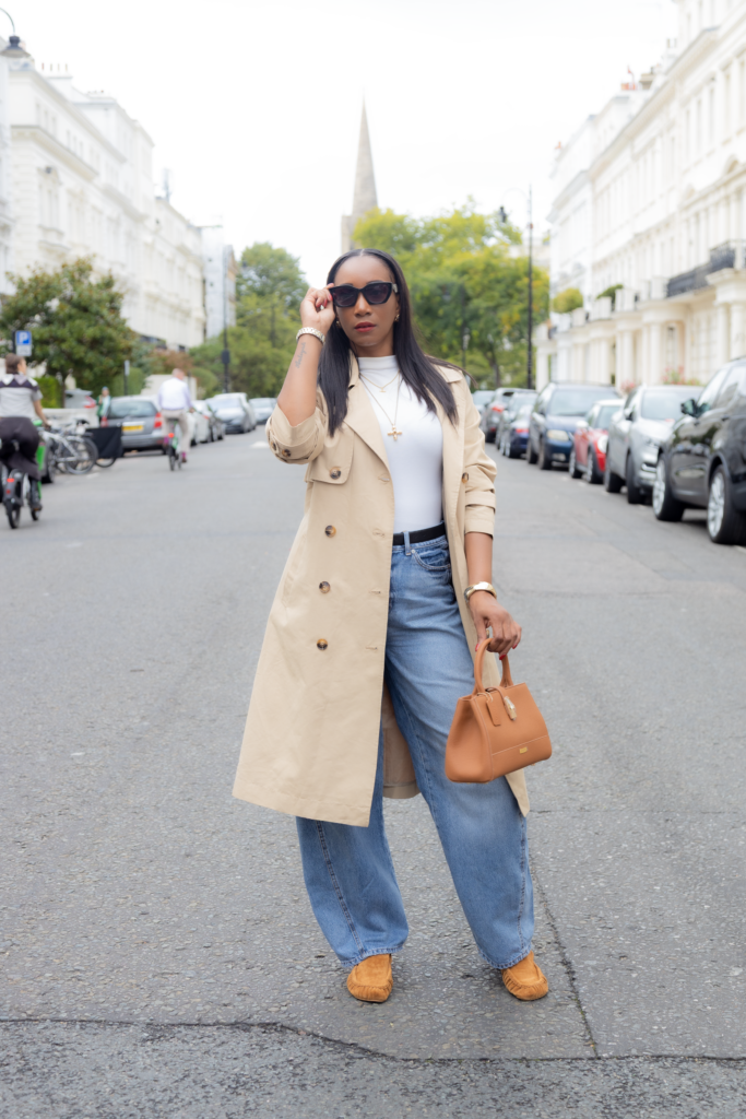 Hand on glasses in the street